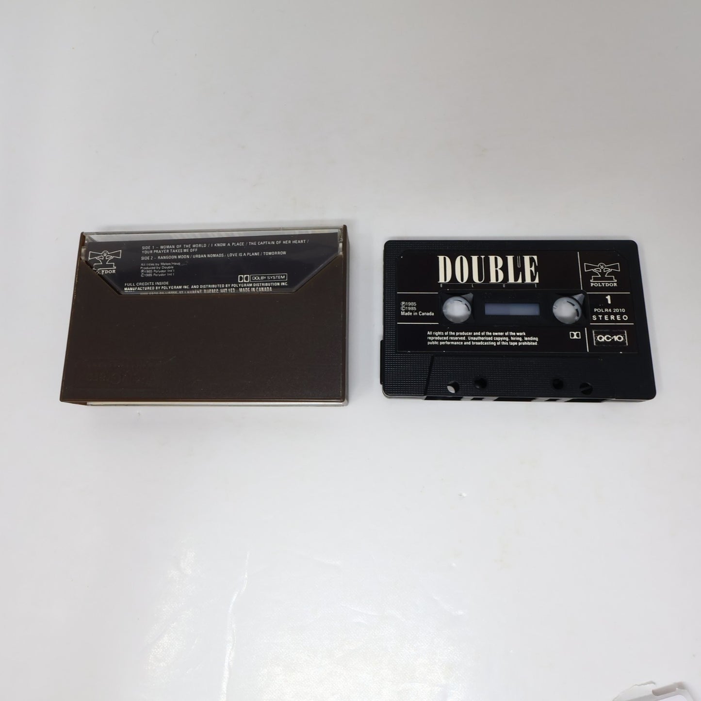 Double Blue Cassette Captain Of Her Heart/Woman Of The World Polydor POLR4 2010