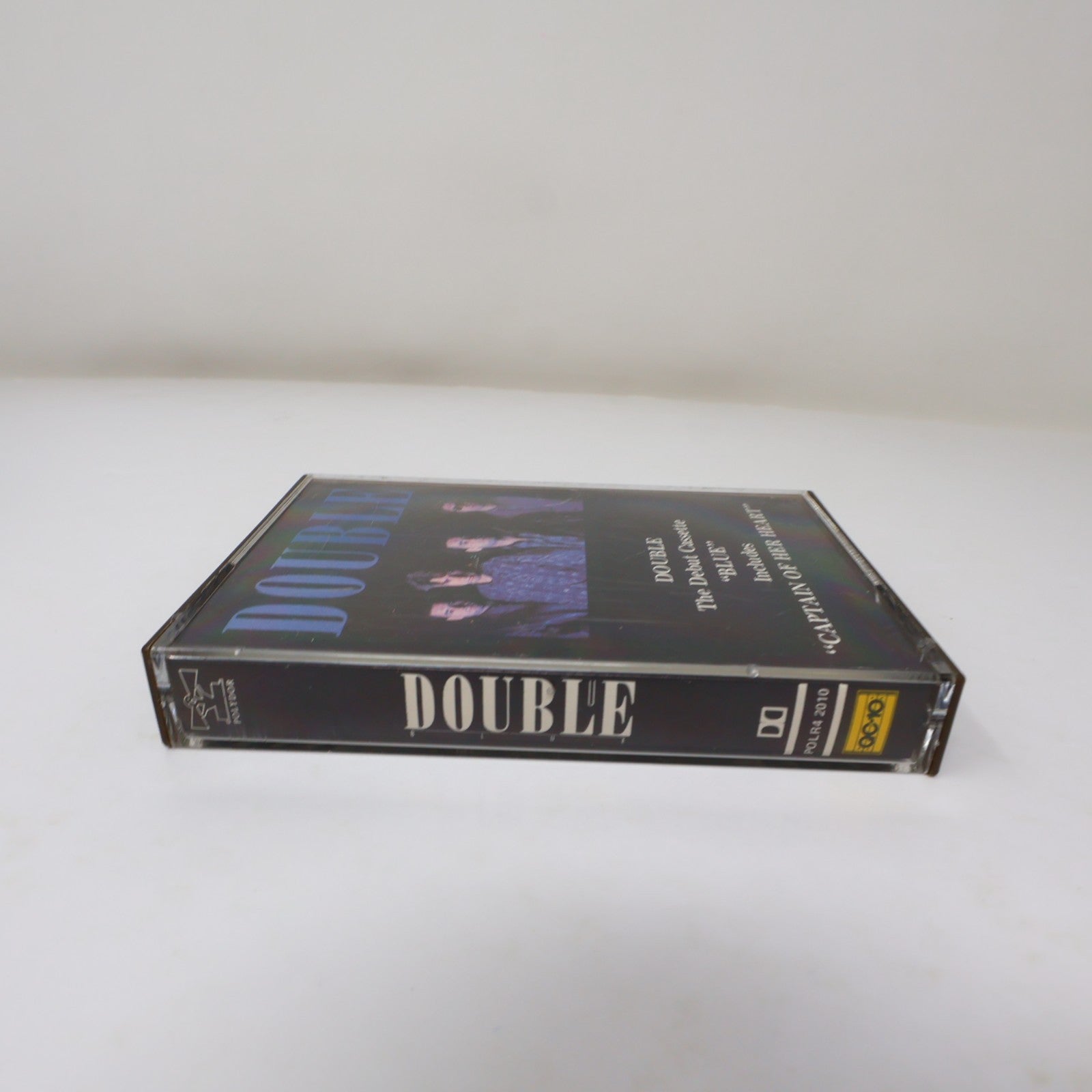 Double Blue Cassette Captain Of Her Heart/Woman Of The World Polydor POLR4 2010
