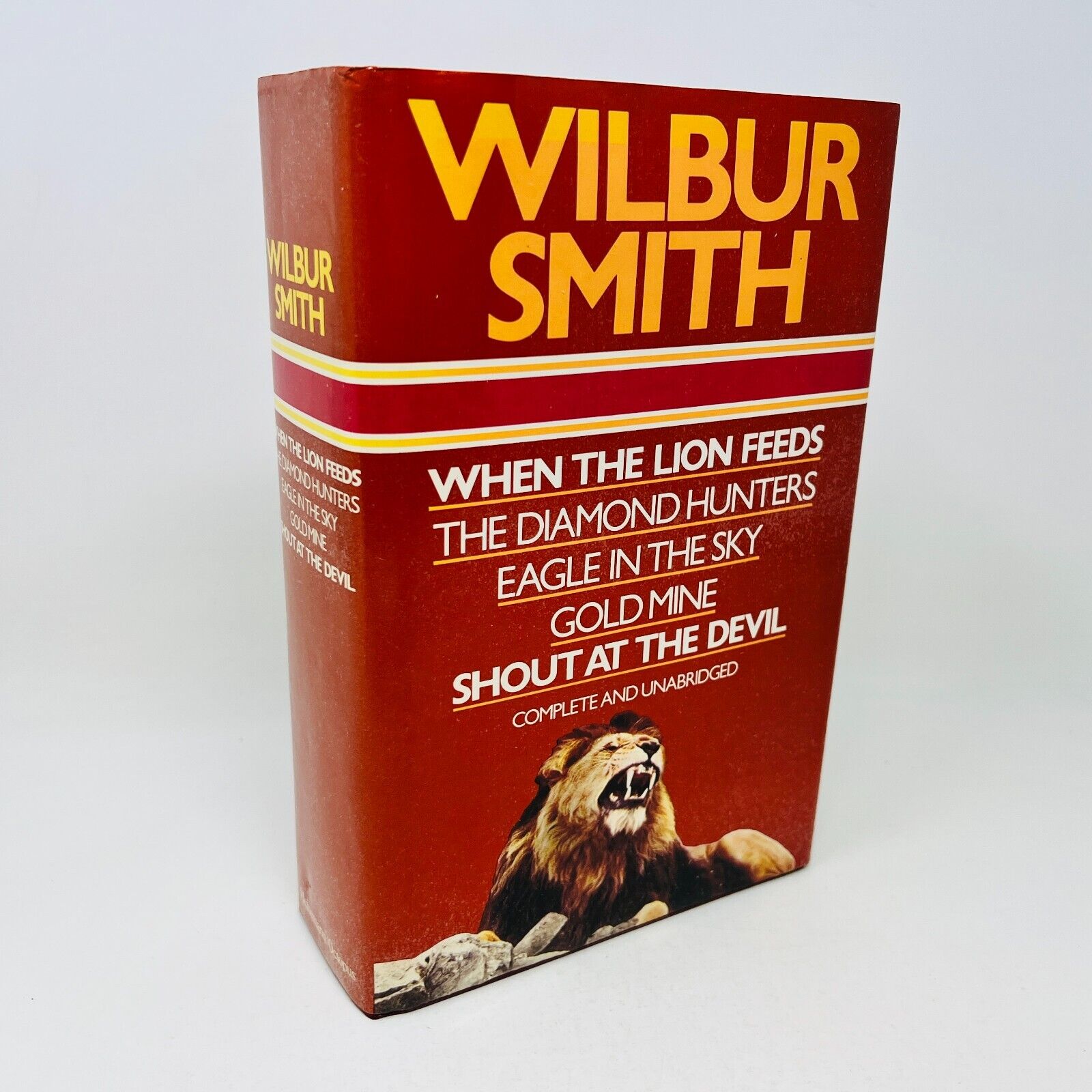 1984 Wilbur Smith Omnibus Book When The Lion Feeds/Diamond Hunters Hardcover DJ