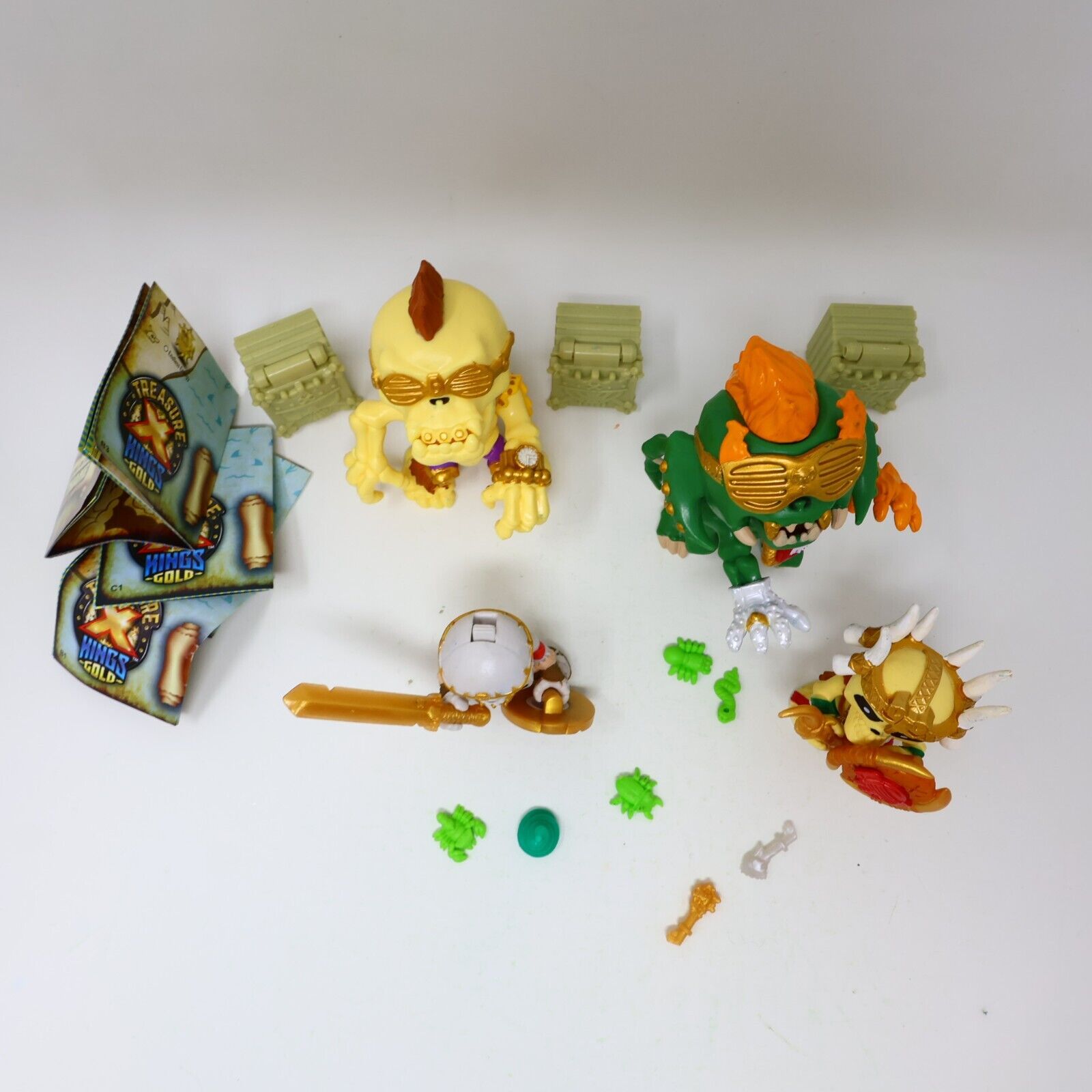 Lot of 4 Treasure X Kings Gold Figures Infernog Gold Nuckles Ivory Slicer Moose