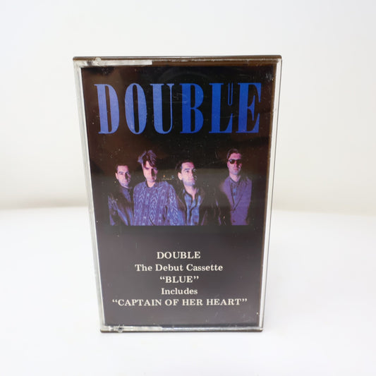Double Blue Cassette Captain Of Her Heart/Woman Of The World Polydor POLR4 2010