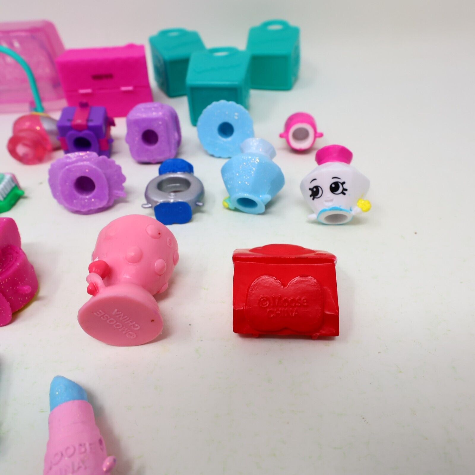 Lot of 21 Shopkins Figures Toys Mixed Makeup Parfume Dresses Gifts Baskets Moose